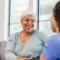 Senior woman benefiting from home care during cancer treatment.